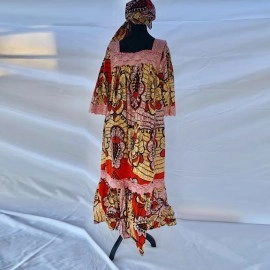 African dress with lace designs and hair wrap 